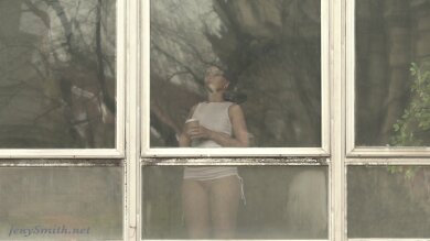 Jeny Smith teasing the strangers thru the window