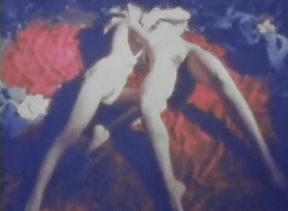 Blue-tinted Vintage Loop Shows Retro Couple in Raw 70s Action