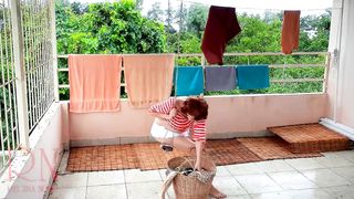 Nude Laundry. the Maid is Drying Clothes into the Laundry.