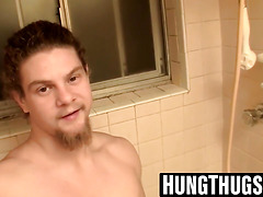 Straight hunk washes and jerks shaved cock in the shower