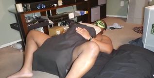 Humping a pile of pillows on the floor