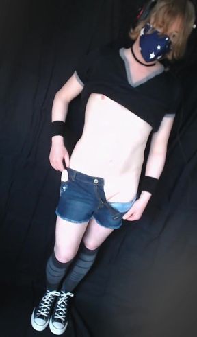 Smooth redhead femboy in a cage with a vibrator