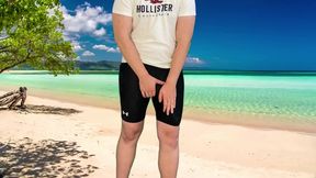 Huge cock gets jacked off on public beach