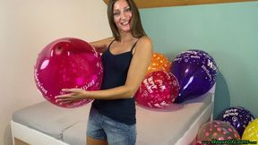 girlfriend popping your Q16 and Q24 *Happy Birthday* balloons