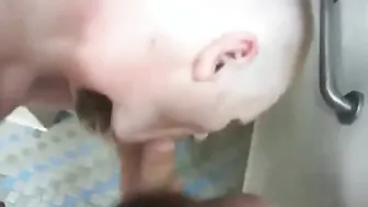 Twink deepthroats stranger in public bathroom
