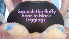 Squash the fluffy bear in black leggings