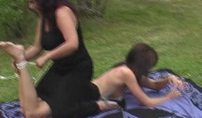 tied naked outdoors