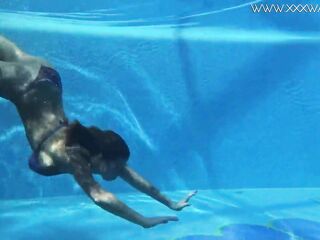 Heidi submerges herself in to the sexy pool