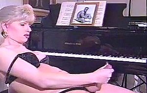 Lonely shemale jerks by the piano