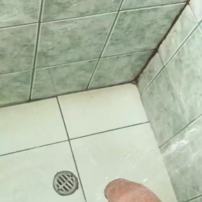 man in the shower ends up masturbating until he comes - watch the end