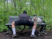 Biker In Spandex Stretching At The Park
