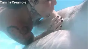 Hot milf with big boobs gives underwater bj