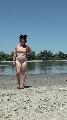 Tattooed MILF Gets Surprised While Sunbathing