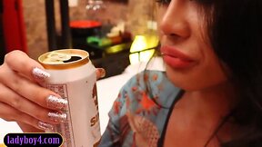 Lingerie-clad ladyboy with huge implants gives sensual blowjob