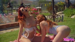 Ginger beauties Molly Stewart and Arietta Adams are making love in the garden