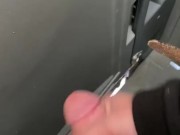 Stroking in a construction porta potty.