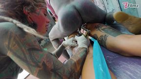 tattoo threesome turns anal heavily inked artist fucks friends ass while inking & cums on fresh tattoo
