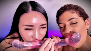 Suki Sin and Simone Ryder getting hot and heavy wet with a new clear dildo