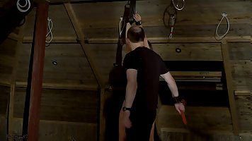 Handcuffed brunette Alexa Libertin gives blowjob in the attic