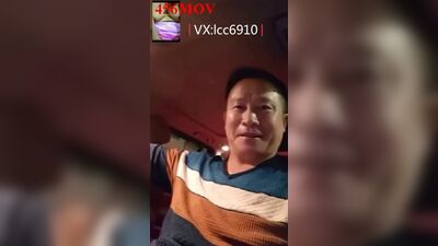 Chinse older guy is filming himself while he's playing with his pecker