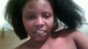 Dirty black slut stretches her pussy with fingers on webcam