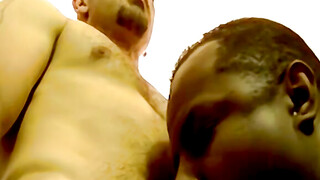 Ebony gay demonstrates his excellent cock sucking technique