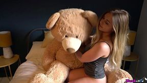 Libidinous beauty Sophie K is playing with her favorite big teddy bear