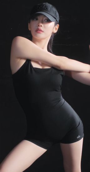 Female athlete in black leotard