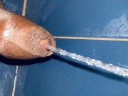 Good clear piss game on the bathroom floor