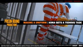 Making A Uniform : Kora Gets a Tedious Task - Adorable blue hair prison girl is made to perform tedious labor making letters for uniforms. She is shackled to a bench and dressed in orange and white striped jail scrub uniform barefoot -1080p -MOV copy