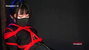 Ninja Girl Tied In Red Ropes