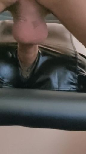 Ass toy in leather hotpants finishes my cock