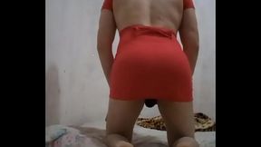 Usando vestido curto colado e calcinha fio dental