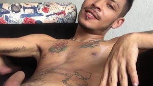 BarebackLatinoz: Skinny Juan stroking on sofa