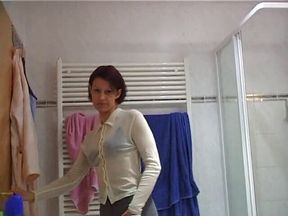 Redhead babe with sexy body is having a shower