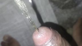 PEEHOLE CLOSE UP PEEING