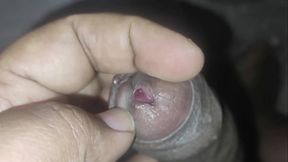 PEEHOLE CLOSE UP PEEING