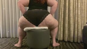 Amazon Amanda Sits on a cushion