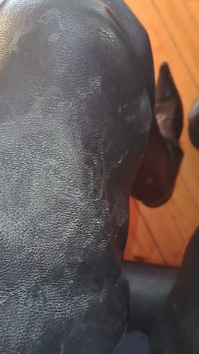 Dirty stained leather chaps and boots