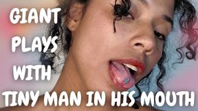 GIANT PLAYS WITH TINY MAN IN HIS MOUTH
