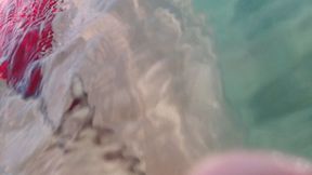 Under water ballbusting in high wawes