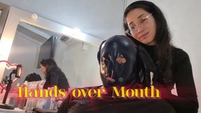 Hands over mouth with leather gloves