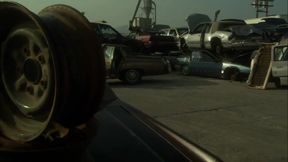 Hot sexual moment in a car demolition...