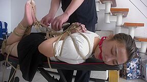 Slender Asian Girl With Sexy Legs Is Introduced To Bondage