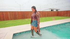 Iris Swims in a Denim Skirt, Boots, and Long Flannel Shirt