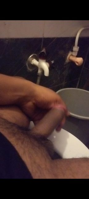 Men mastrubation in bathroom