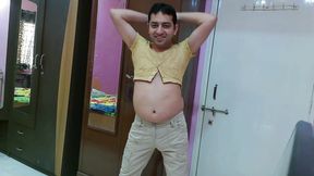 Cute sissy crossdresser femboy Sweet Lollipop in a top and pants.