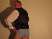 Kudoslong in a shirt and waistcoat strips and wanks his shaved uncut cock