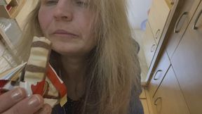 Licking a Small Candy Seductively