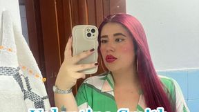 Lying submissively and getting milk on her face, a cute chubby Colombian girl